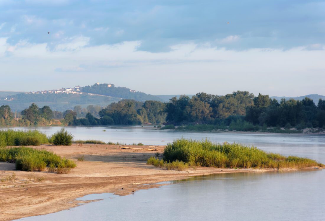 Sandbank in the Loire river and hill of Sancerre village