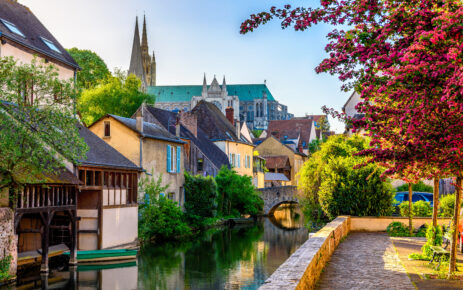 Eure River embankment with old houses in a small town Chartres, France